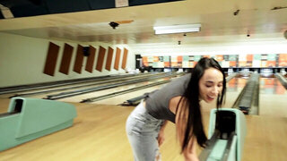 Brunette girl Gaby Ortega blows a horny guy at bowling alley