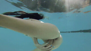 Underwater fucking with a major creampie