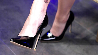 Iris Leon showing off her feet after taking off her shoes