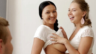 Two hot chicks are teasing one dude before fucking him