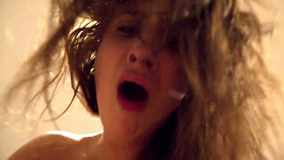A horny girl with a nice set of tits is sliding her mouth on a cock