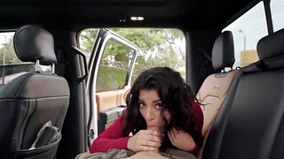 Beautiful brunette is paying a taxi ride with a blowjob