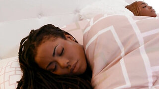 Thick ebony woman having sex with a busty bimbo