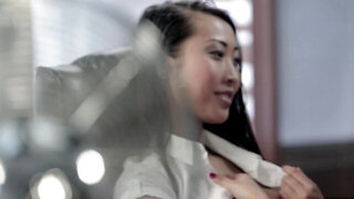 A hot all natural girl that has sexy tits is taking off her clothes