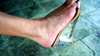 Ari Parker showing off her feet in a fetish video