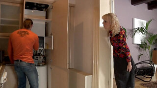 Hot cougar is praying on a young man and she is giving a blow job