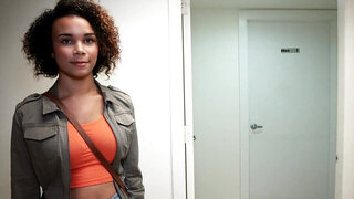 Curly ebony amateur is presented with a big cock to play with