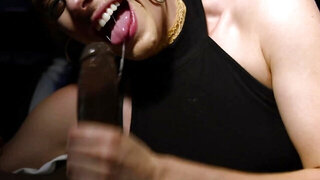 Short-haired blonde is riding a black cock in a car