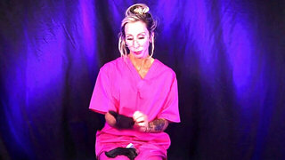 Plastic MILF gives him a very sterile handjob on cam
