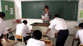 Japanese headmistress gives head and swallows cum