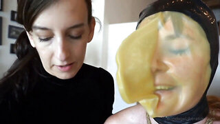 Chubby submissive woman lets the domina do everything