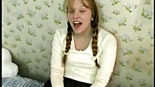 Nasty schoolgirl in ponytails with pierced pleasure button gets pounded in couch