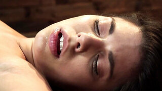 Tied up girl Gina Valentina is placed on a Sybian sex machine