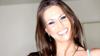 A busty woman with nipple piercings removes her sexy bikini