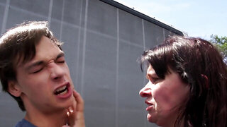 Vera Dap wearing stockings as a man licks her in a car