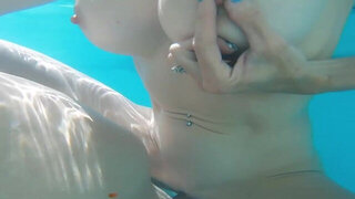Underwater fuck with a big boobs brunette babe