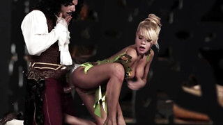 A hot blonde with large tits is having her cunt fucked by a horny dude