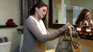 Long haired brunette has sex in front of a fireplace