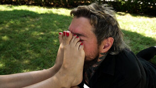 Megan Love is in the park where she gets worshipped