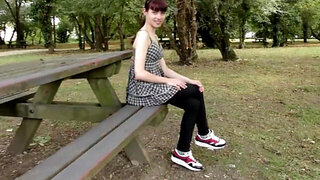 Amateur babe in a fishnet onesie bends over to toy her muff