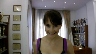 A brunette that removes her bra is fucked on the bed
