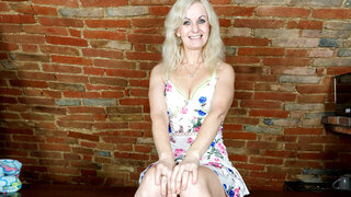 Hot mature baddie masturbates with a black sex toy