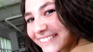 Chubby brunette Liz Jordan smiling in a POV video