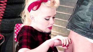 Pinup blonde chick goes down on the handsome biker