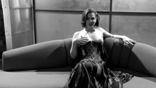 Black and white video of a beautiful babe in stocking being all alone