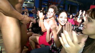 Amateurs at the strip club suck on throbbing cock erotically