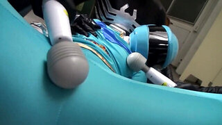 Wearing a helmet while few people use toys on her