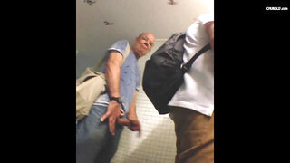 Voyeur films old males in the public restroom