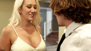 A blonde milf places her hands on a large cock to tug it nicely