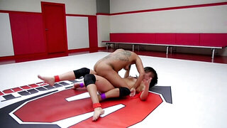 Annie Cruz & Cali Confidential are wrestling naked on the floor