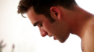 A blonde with tiny tits is in the prone position, getting fucked deeply