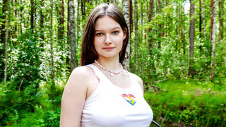 Attractive brunette goes for a solo ride in the park