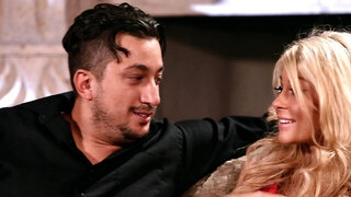 A blonde slut is getting fucked hard on a good leather sofa