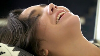 Excited girlfriends enjoy sensual lesbian sex in living room