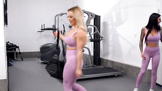 Lesbian workout of the big-tittied blonde and tattooed partner