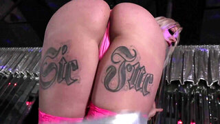 Stripper with a great ass and tattoos is putting on a show