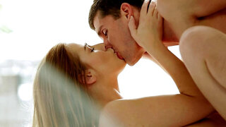 A delicate babe is pushed against the desk and spread wide open