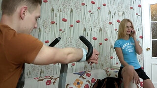 Blonde girl ties boyfriend to fitness machine and cheats on him