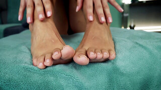 Milan Cheek being flexible and showing her feet off