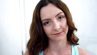 Cute teen kneels in front of her stepbrother's long dick