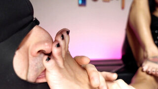 Lily Lane getting her feet worshipped by a submissive man