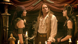 A couple of chicks get their bodies lotioned up and then fuck