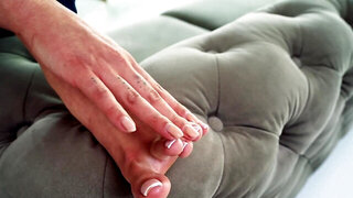 Gal Ritchie plays with her toes in a fetish video