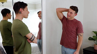 Tattooed lad with a cute face is giving a nice handjob