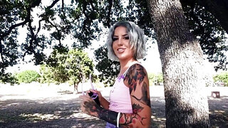 Tattooed babe with dyed hair sucking in point of view