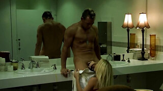 Excited pilot stretches busty blonde colleague in restroom